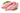 Two raw cuts of rabbit legs with fresh herbs